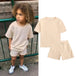 2 - piece T-shirt and shorts tracksuit set for children Multivariant - Nexellus