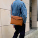 Leather bag with adjustable strap for macbook