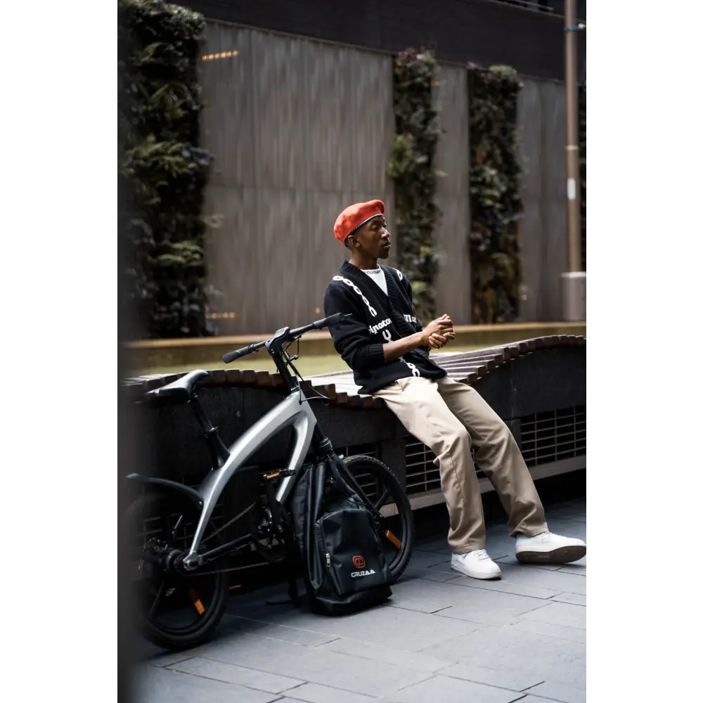 Official carbon black e-bike with built-in speakers &