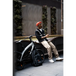 Official carbon black e-bike with built-in speakers &