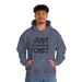 Stay cozy in style with our “just cast” print hooded