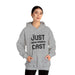 Stay cozy in style with our “just cast” print hooded