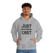 Stay cozy in style with our “just cast” print hooded